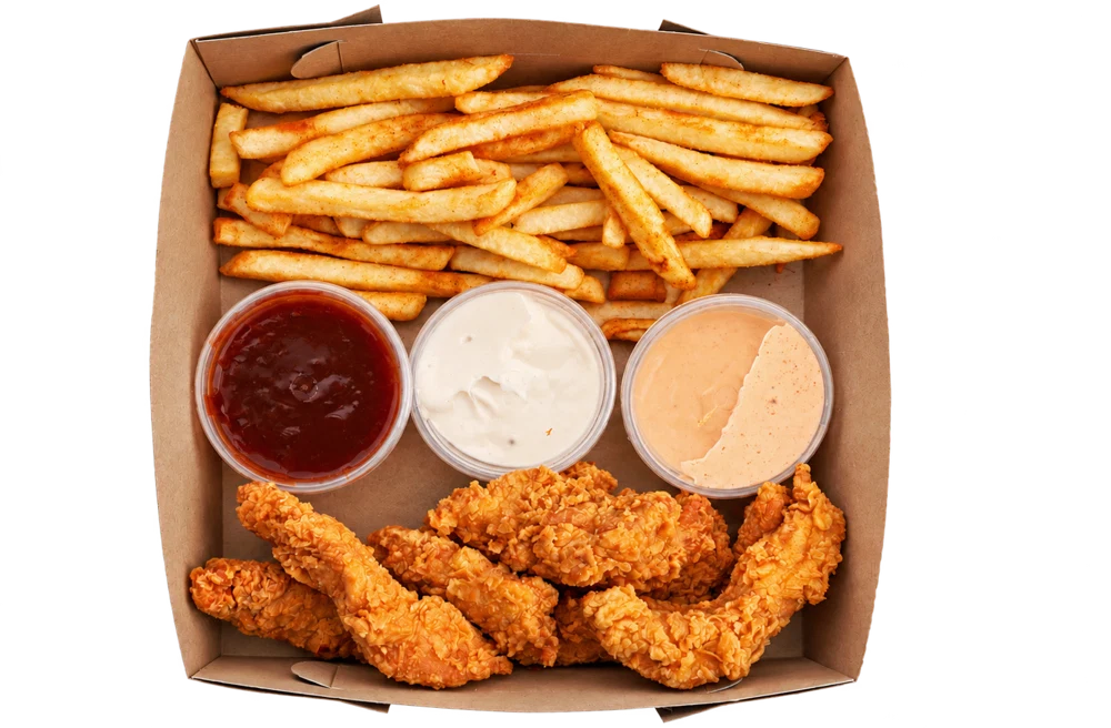 Cheekies signature chicken strips with three dipping sauces and fries