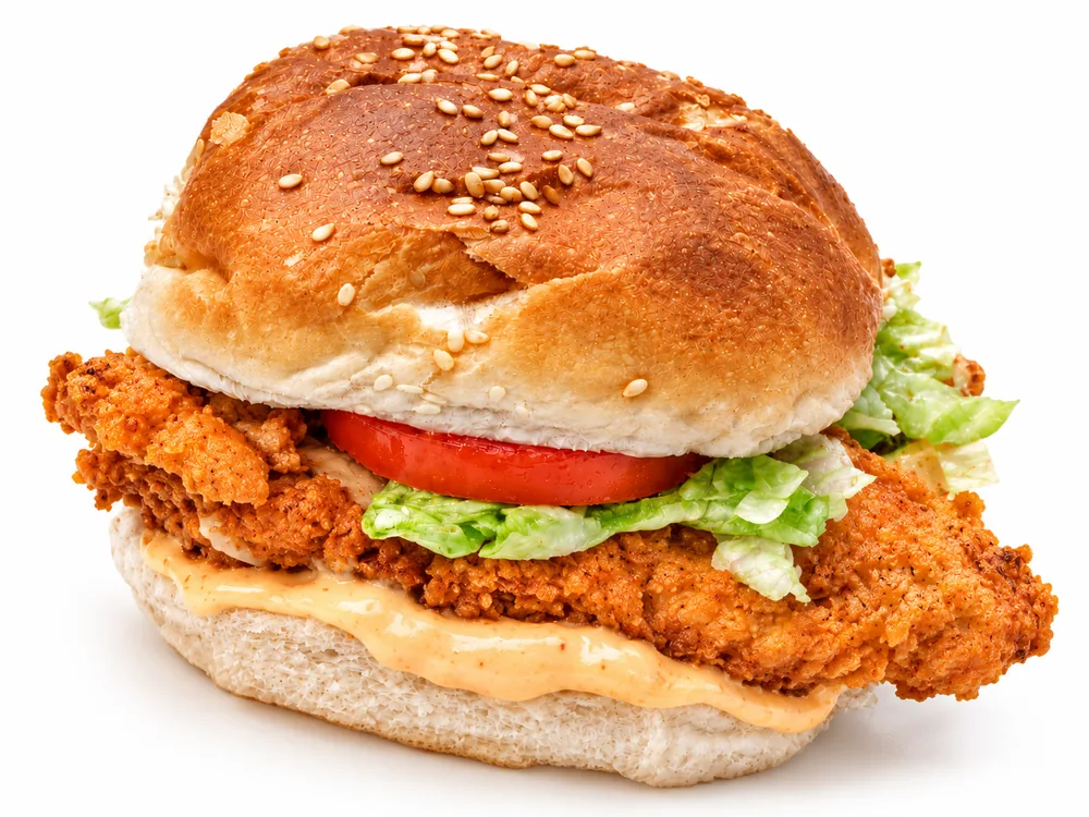 Cheekies Cajun chicken burger with lettuce, tomato and Cajun mayo