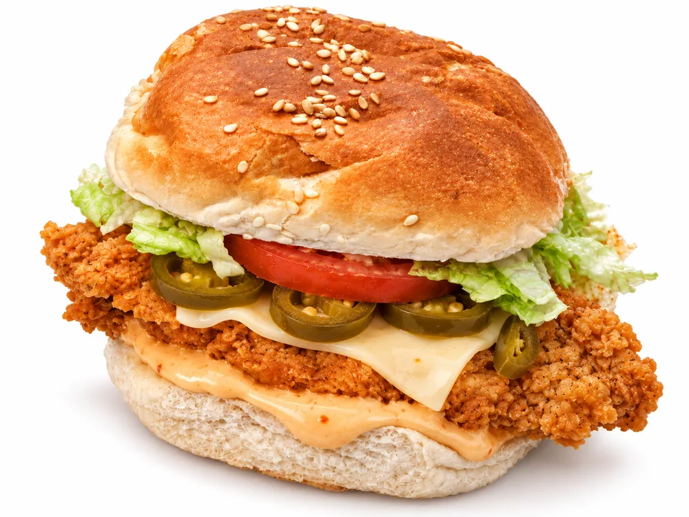 Cheekies Cheesy Jalapeno chicken burger with cheese, jalapenos, lettuce and tomato